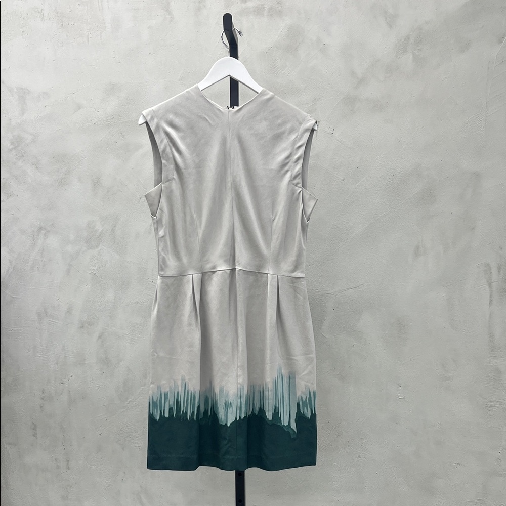 Elegant Sleeveless Dress with Green Accents